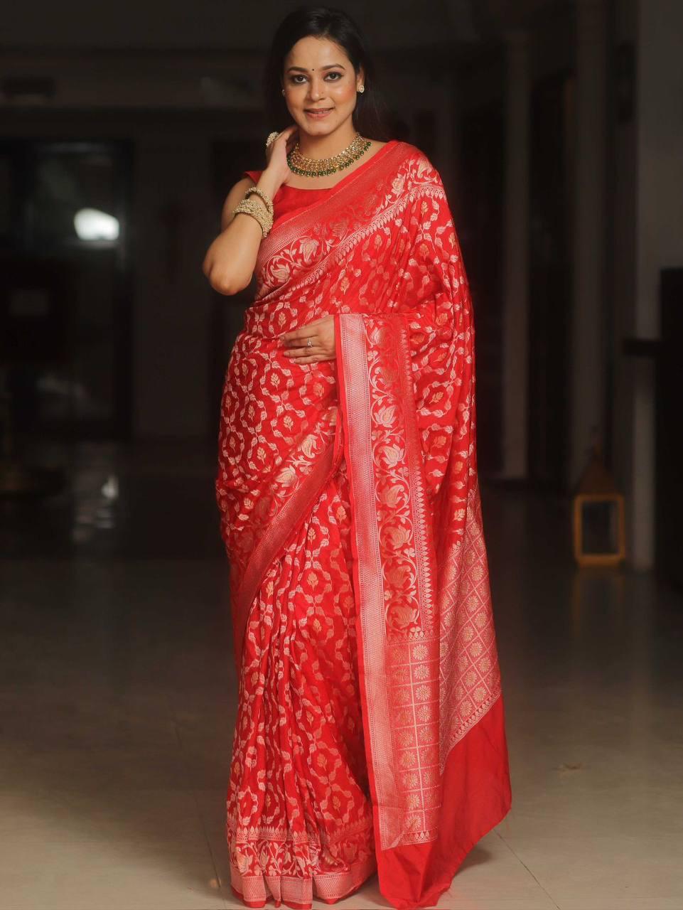 Flaunt Red Soft Banarasi Silk Saree Gleaming Blouse Piece