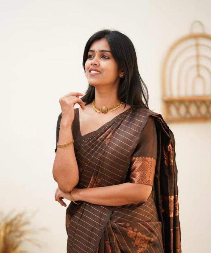 Adorning Brown Soft Banarasi Silk Saree With Gratifying Blouse Piece