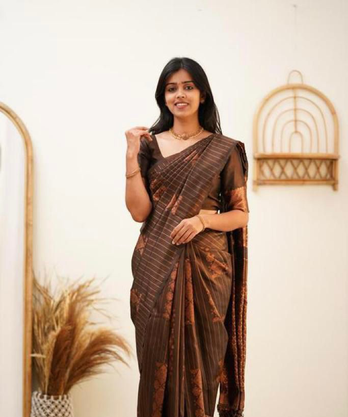 Adorning Brown Soft Banarasi Silk Saree With Gratifying Blouse Piece