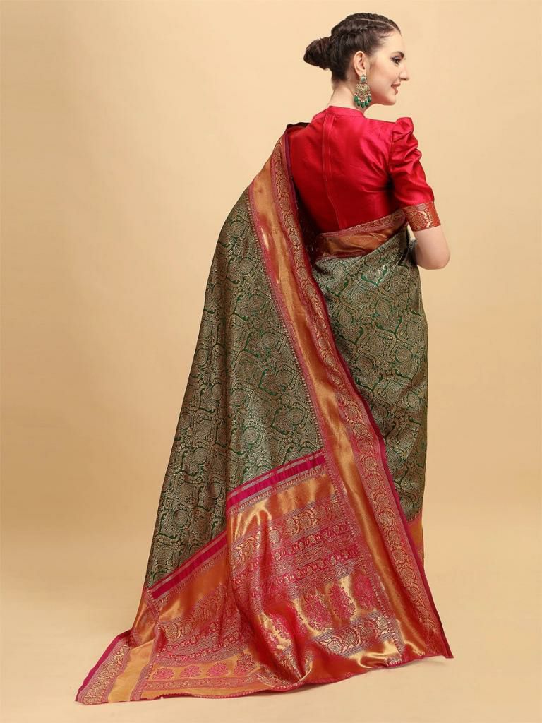 Surpassing Dark Green Soft Silk Saree With Dazzling Blouse Piece