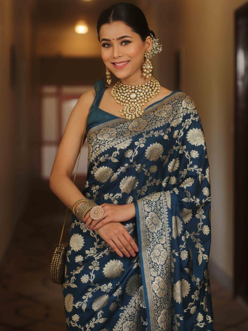 Jubilant Navy Blue Soft Silk Saree With Luminous Blouse Piece