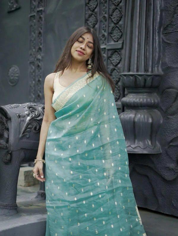 Vivacious Turquoise Linen Silk Saree With Incomparable Blouse Piece