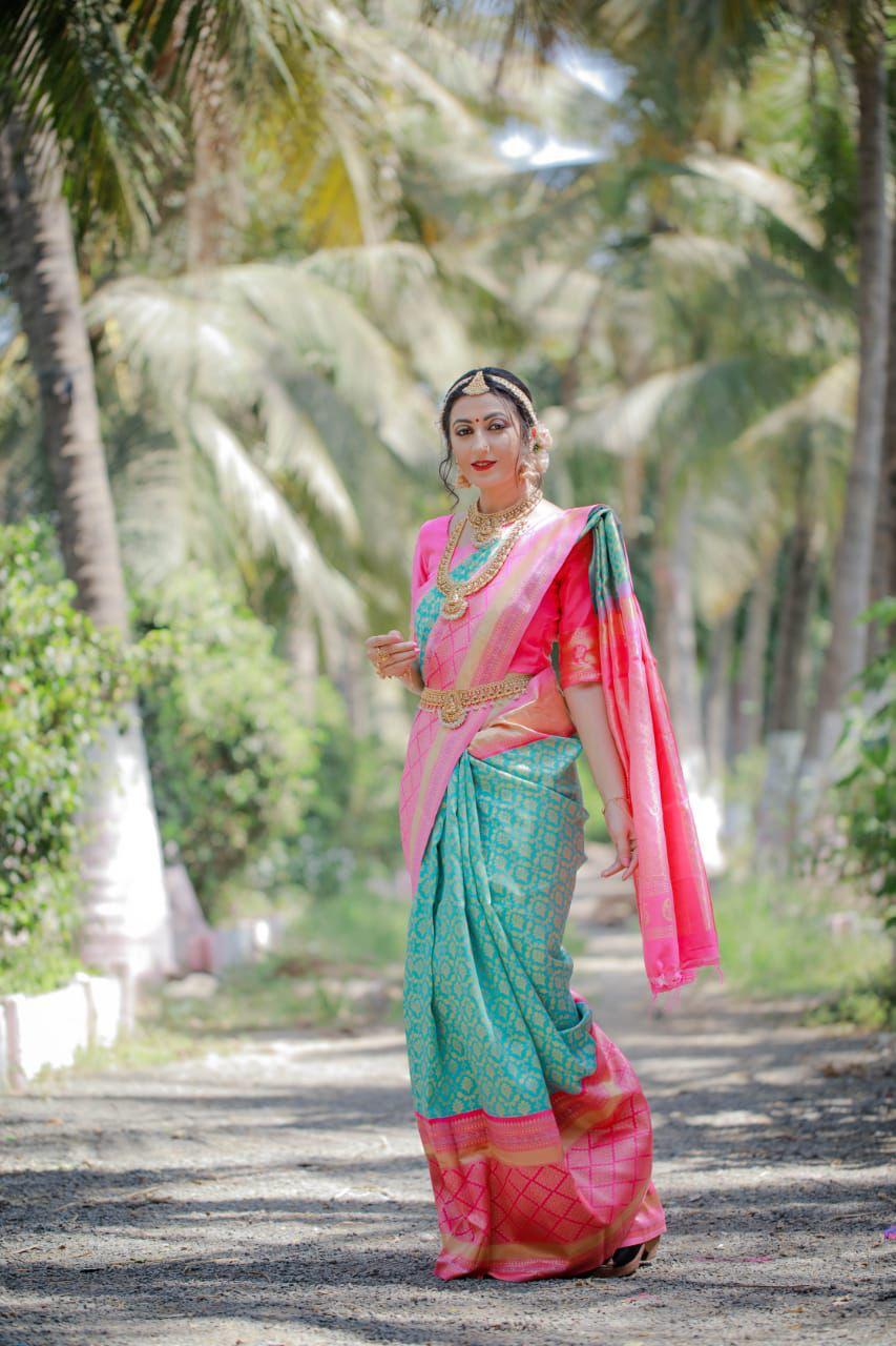 Gratifying Firozi Banarasi Silk Saree With Engrossing Blouse Piece