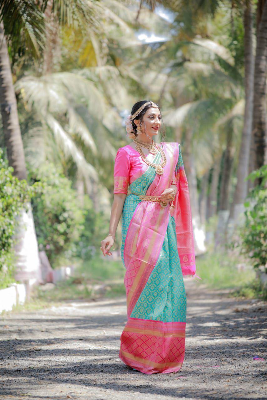 Gratifying Firozi Banarasi Silk Saree With Engrossing Blouse Piece