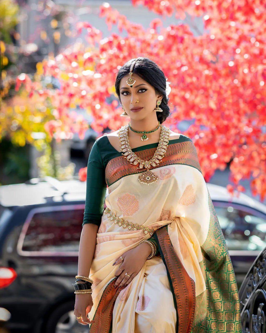 A glam Beige Soft Silk Saree With Classic Blouse Piece