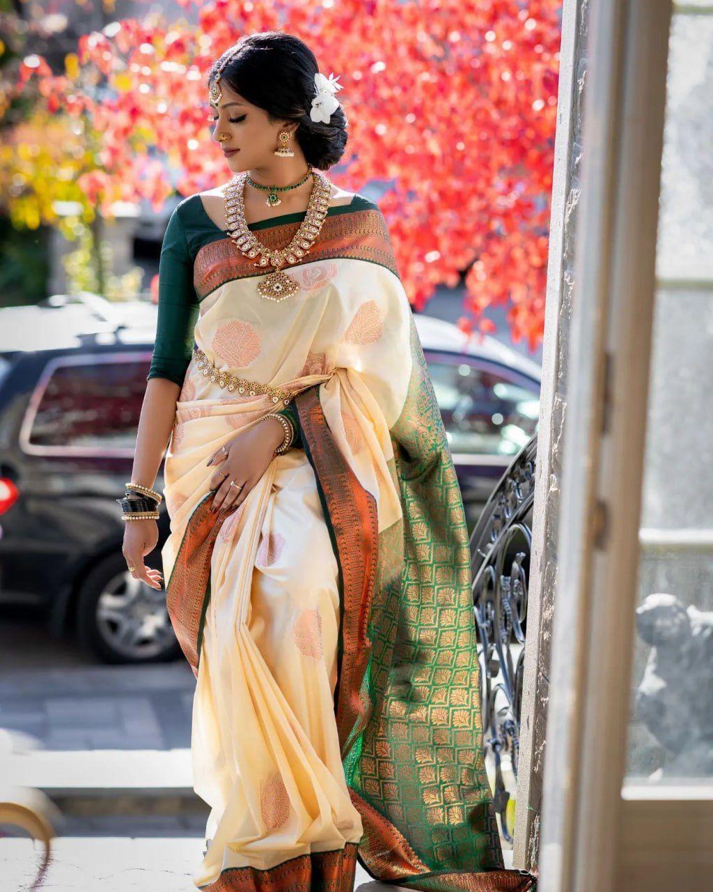 A glam Beige Soft Silk Saree With Classic Blouse Piece