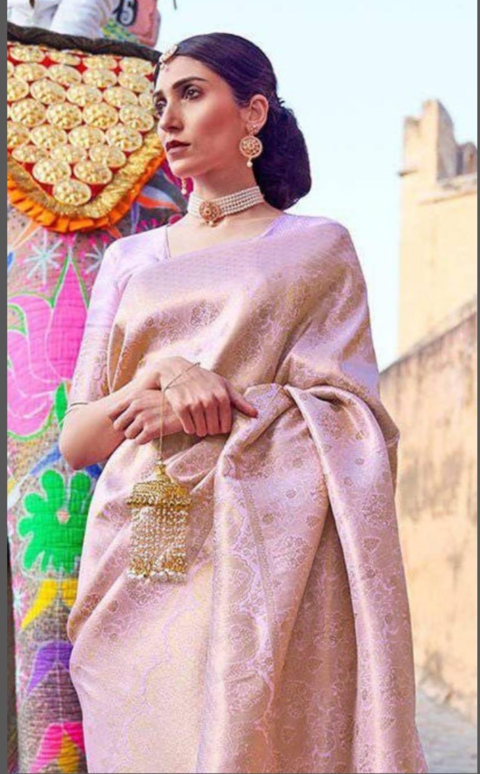 Improbable Pink Soft Banarasi Silk Saree With Exuberant Blouse Piece
