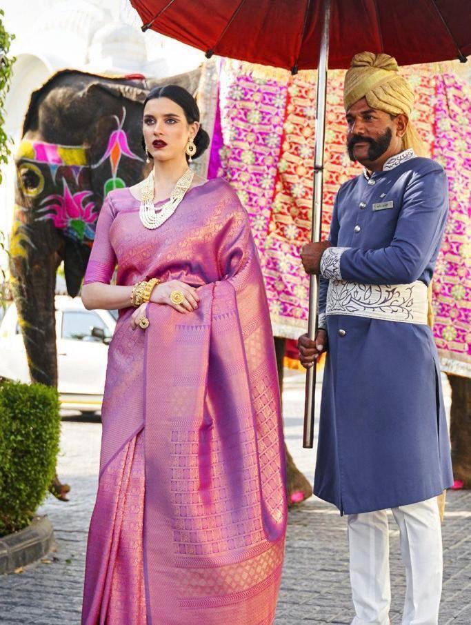 Tempting Purple Soft Banarasi Silk Saree With Snappy Blouse Piece