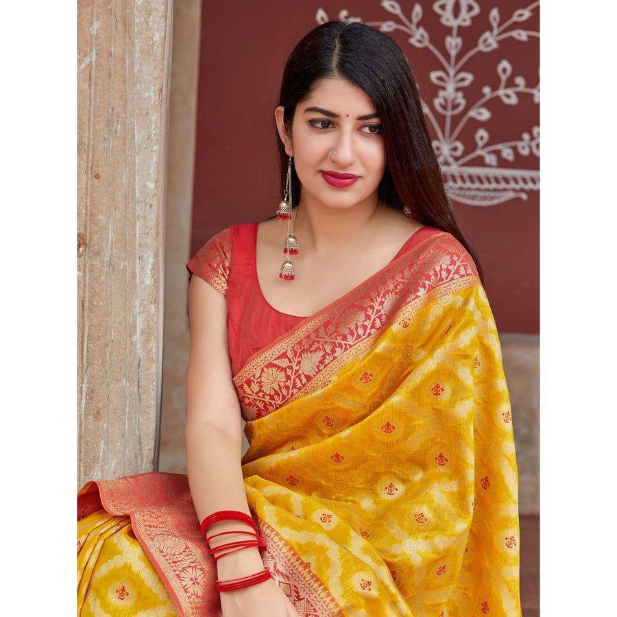 Adorning Yellow Soft Banarasi Silk Saree With Flattering Blouse Piece
