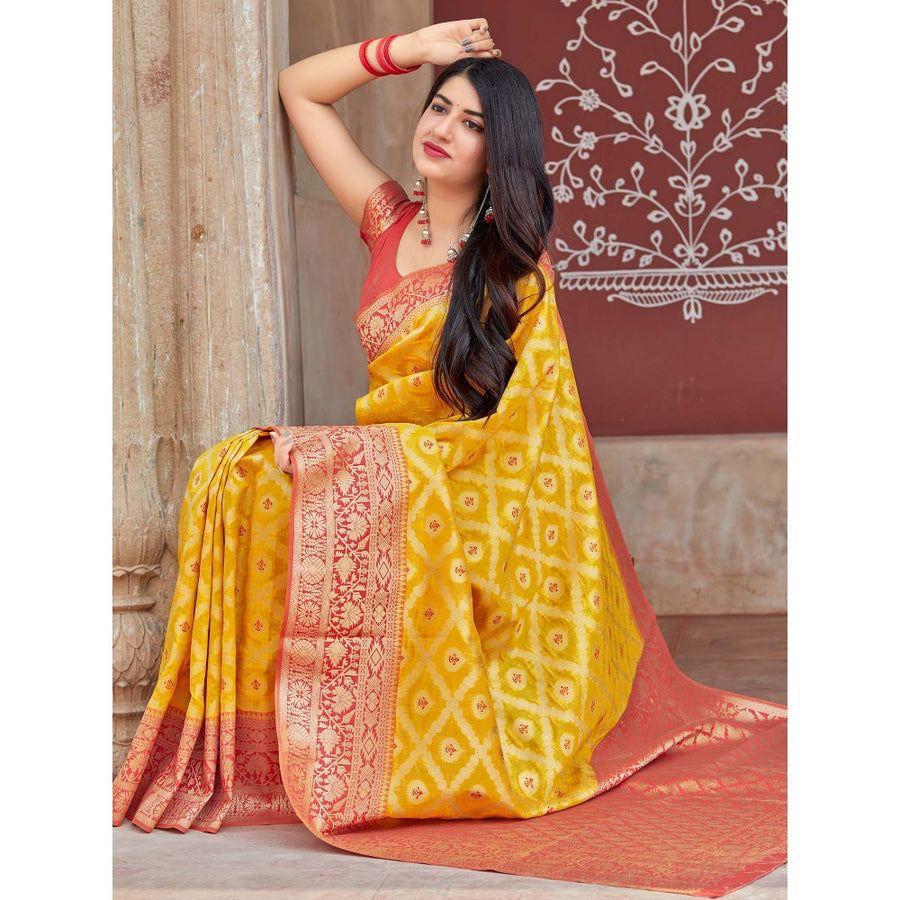 Adorning Yellow Soft Banarasi Silk Saree With Flattering Blouse Piece