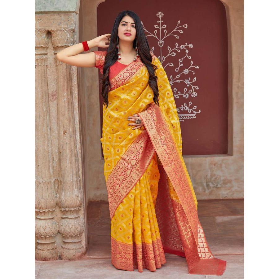 Adorning Yellow Soft Banarasi Silk Saree With Flattering Blouse Piece