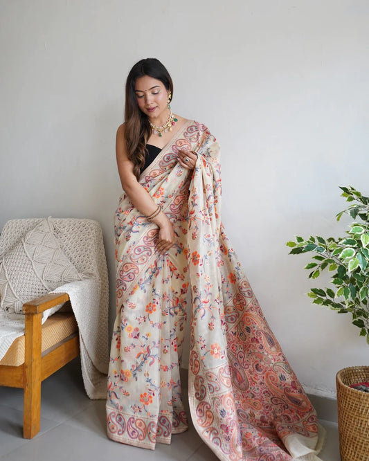 Stylish Cream Banarasi Silk Saree With Gleaming Blouse Piece