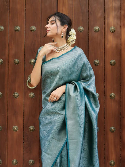 Prettiest Firozi Soft Silk Saree With Delectable Blouse Piece