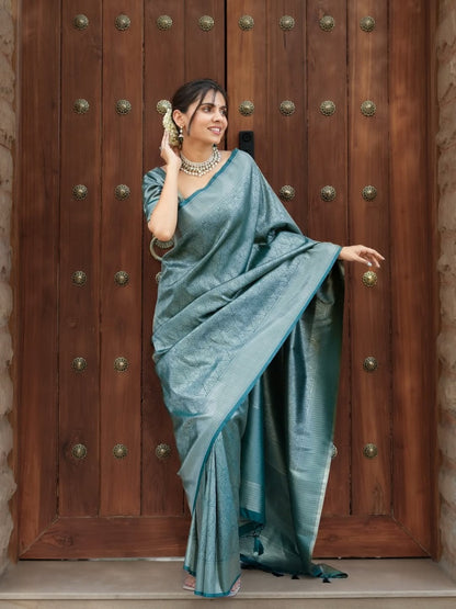 Prettiest Firozi Soft Silk Saree With Delectable Blouse Piece