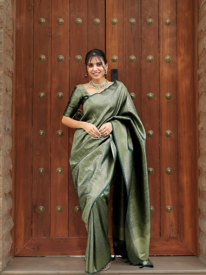 Prettiest Green Soft Silk Saree With Delectable Blouse Piece