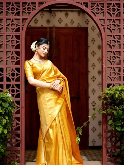 Prettiest Yellow Soft Silk Saree With Delectable Blouse Piece