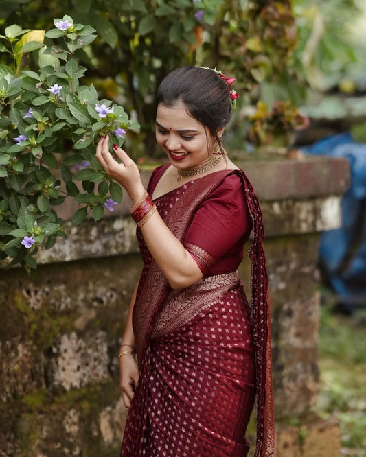 Twirling Maroon Soft Banarasi Silk Saree With Surpassing Blouse Piece