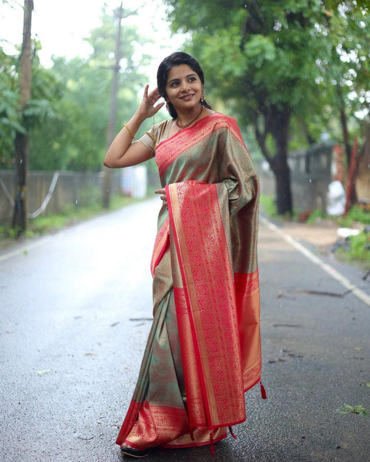 Artistic Sea Green Soft Silk Saree With Pulsating Blouse Piece