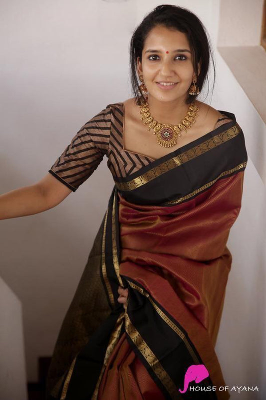 Engrossing Maroon Soft Silk Saree With Inspiring Blouse Piece