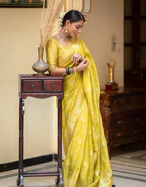 Amiable Yellow Soft Silk Saree With Allure Blouse Piece