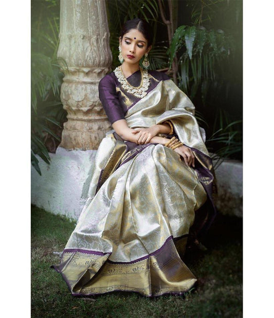 A glam Beige And Purple Soft Silk Saree With Groovy Blouse Piece