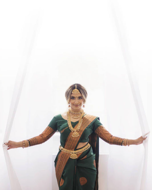 Surpassing Dark Green Soft Silk Saree With Dazzling Blouse Piece