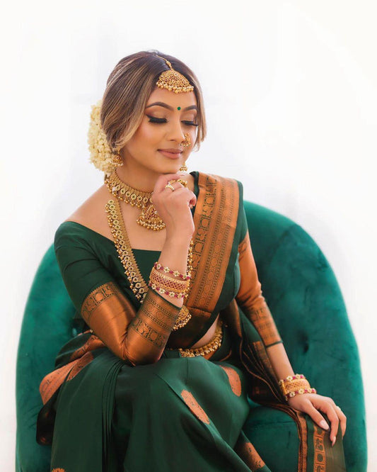 Surpassing Dark Green Soft Silk Saree With Dazzling Blouse Piece