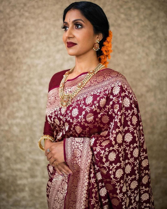 Fancifull Maroon Soft Banarasi Silk Saree With Gossamer Blouse Piece
