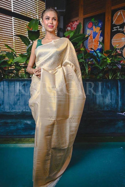 Demesne Beige Soft Banarasi Silk Saree With Demure Blouse Piece