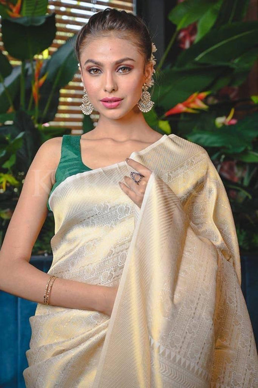 Demesne Beige Soft Banarasi Silk Saree With Demure Blouse Piece