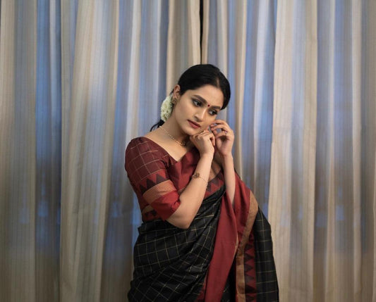 Chatoyant Black Soft Silk Saree With Entrancing Blouse Piece