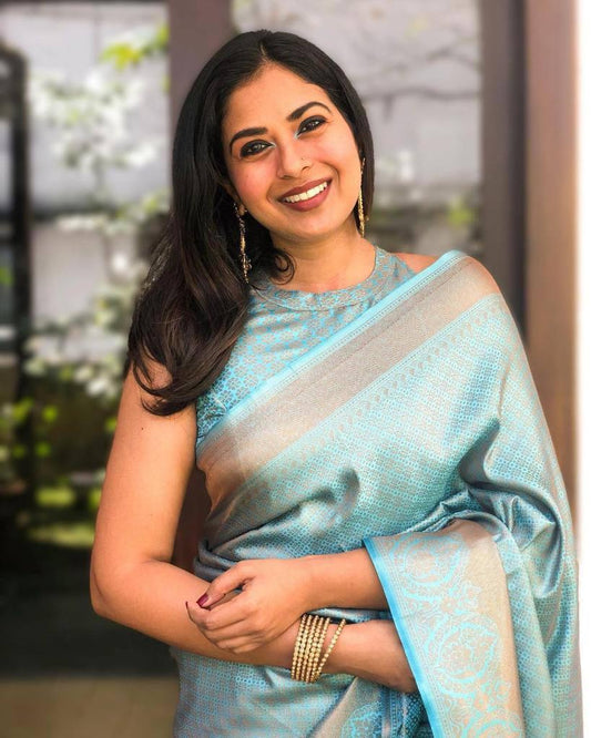 Divine Firozi Soft Banarasi Silk Saree With Bewitching Blouse Piece