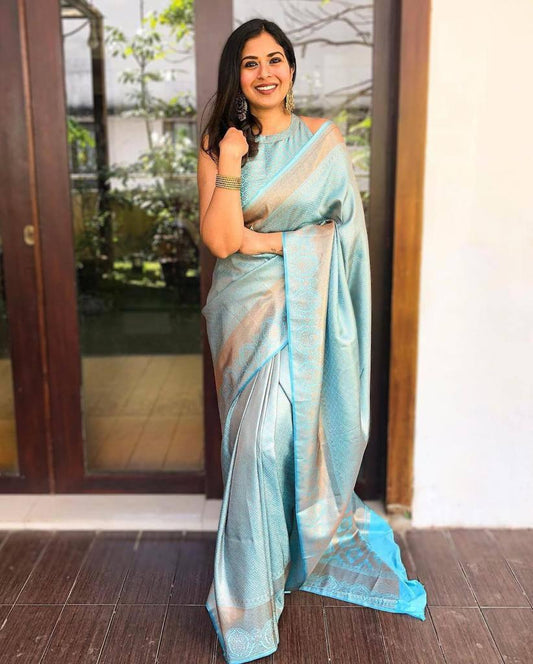 Divine Firozi Soft Banarasi Silk Saree With Bewitching Blouse Piece